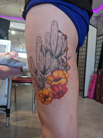 Broken Clover Tattoo, Laser, and Piercing