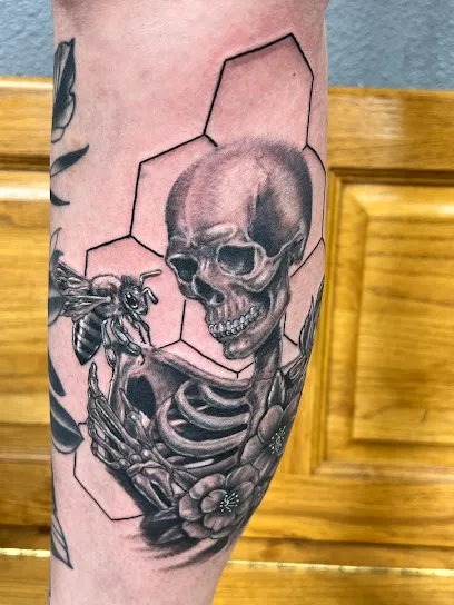 The T.R.I.B.E. Zoo, LLC Tattoo